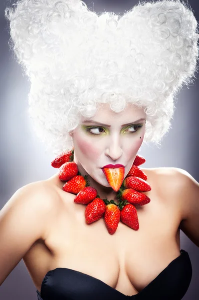 Sexy girl with strawberry necklace — Stock Photo, Image