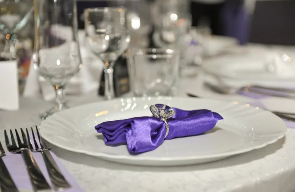 Spoon, fork , clean plates ,glasses and a knife tied up celebratory ribbon. Lie on table — Stock Photo, Image