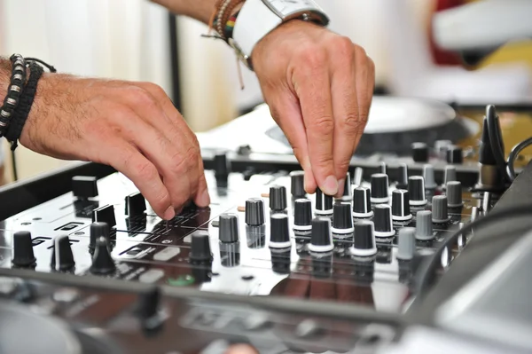 Hand on a mixer, operating the leader — Stock Photo, Image