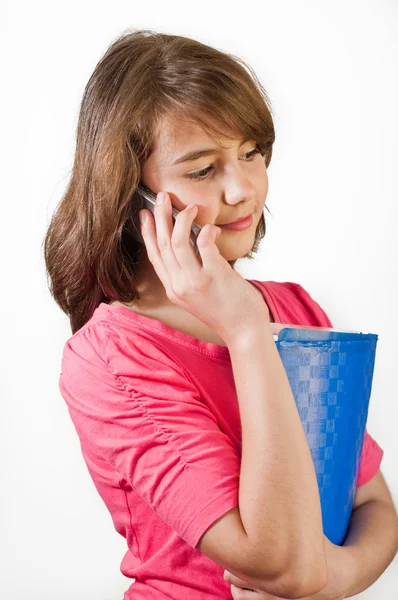 Teenage girl talking on the phone. All on white background. — Stock Photo, Image