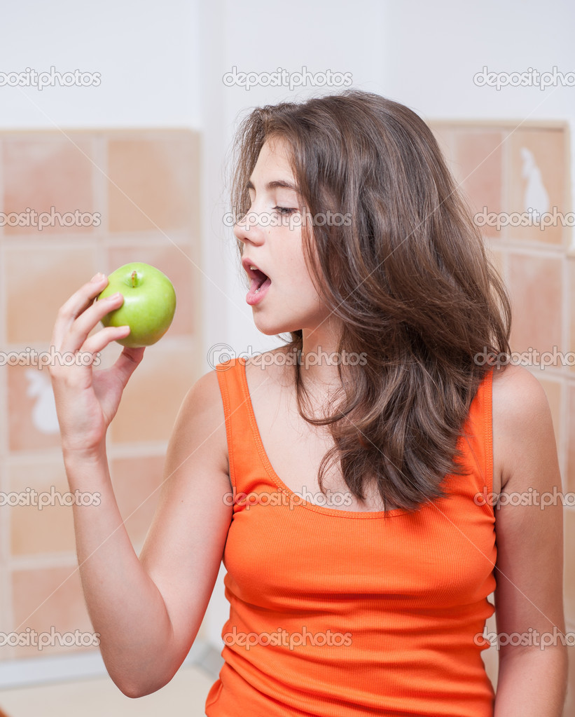 Pretty Teen Girl Eating Apple Indoor Beautiful Teenage Girl Biting An Apple Picture Of Beautiful Teenage Biting A Green Apple Stock Photo By C Iancucristi
