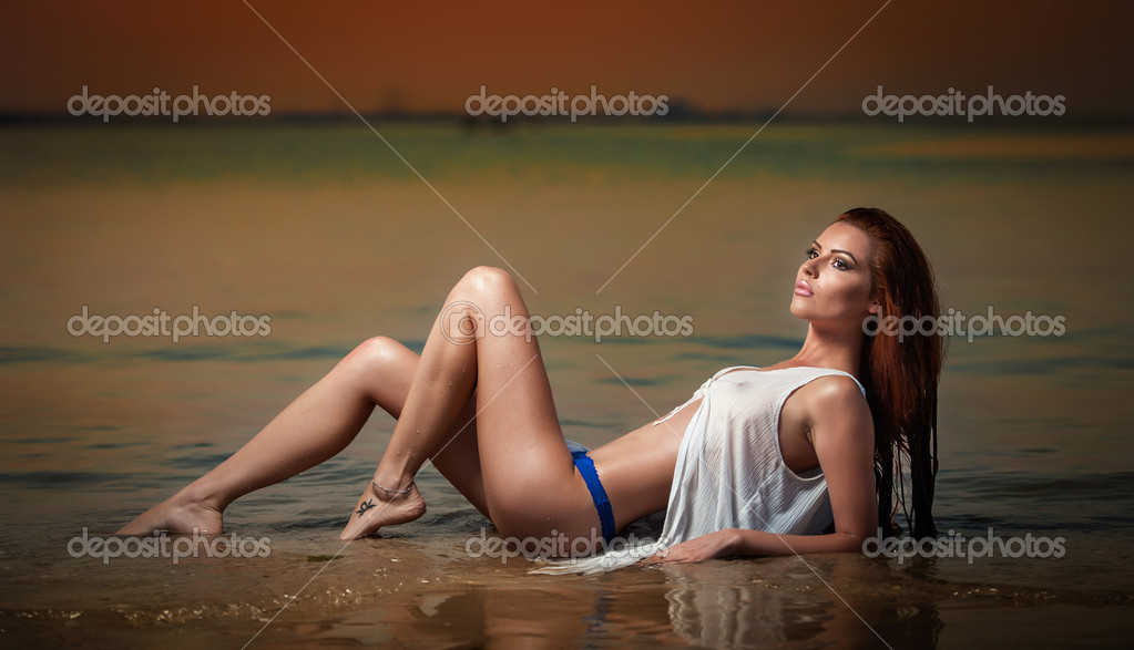 Sexy Woman On The Beach At Sunset Beautiful Brunette