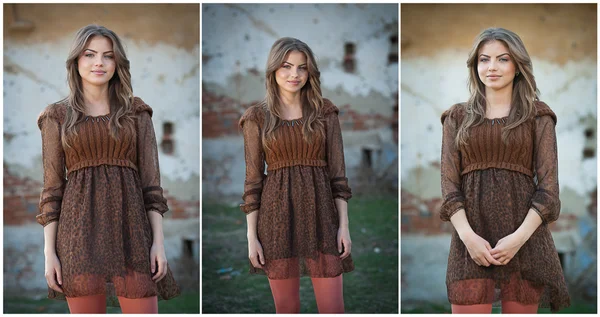 Uma jovem bonita a posar em frente à quinta. Menina loira muito atraente com vestido curto marrom. Jovem romântica posando ao ar livre no campo. Modelo jovem na moda em frente a uma parede de tijolo — Fotografia de Stock