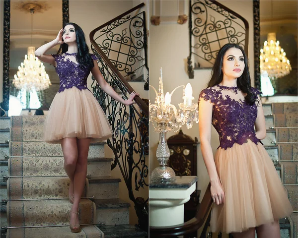 Beautiful long hair girl in nude colored dress posing in a vintage scene. Young beautiful woman wearing a lace dress in luxury scenery on stairs. Sensual elegant young woman in nude dress indoor shot. — Stock Photo, Image