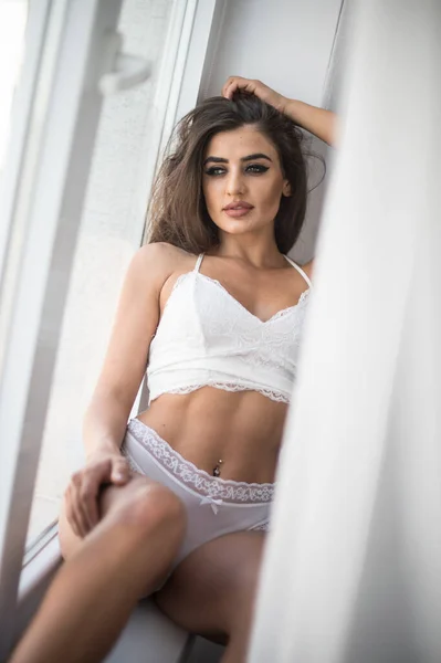 Attractive Sexy Brunette White Lingerie Posing Provocatively Window Studio Shot — Stock Photo, Image