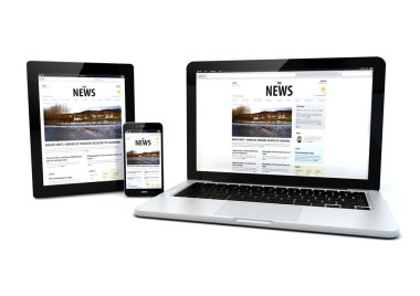 bir tablet, dizüstü bilgisayar ve telefon haberleri