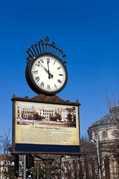 Outdoor clock with Royal Palace history — Stock Photo, Image