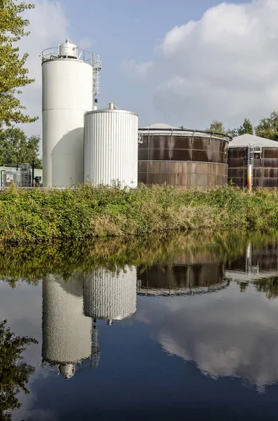 Leeuwarden Netherlands October 2021 Industrial Tanks Silos Reflecting Smooth Water — Stock Photo, Image