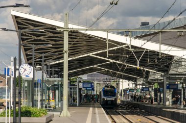 Tilburg, The Netherlands, July 15, 2022: the monumental hyppar steel construction of the roof above the platforms on the railway station