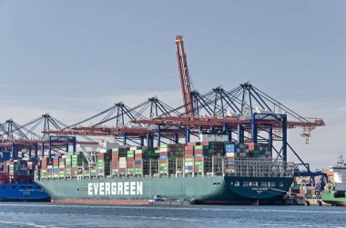 Rotterdam, The Netherlands, August 23, 2022: large vessel loaded with containers moored at a terminal at Yangtze harbour on Maasvlakte