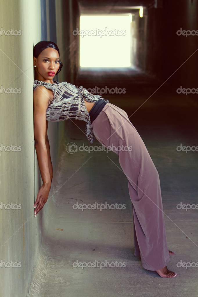Free Photo: Asian Woman Posing Leaning against the Wall