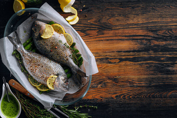 Concept Delicious Dinner Two Dorado Raw Baked Dorado Fish Asparagus Stock Photo