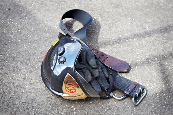 Firefighter Helmet, gloves and belt — Stock Photo, Image