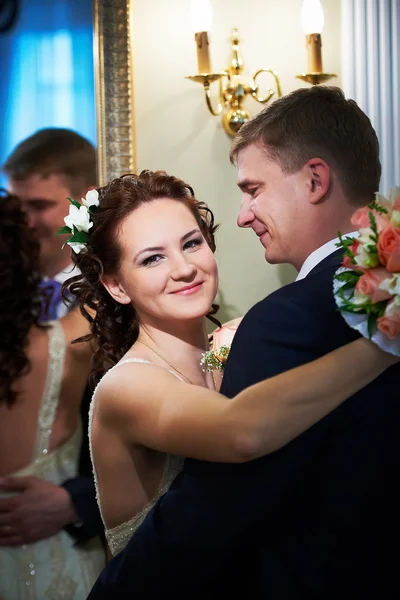 Happy bride and groom about mirror — Stock Photo, Image