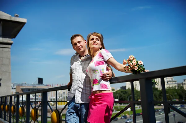 Young happy man and woman at romantic walk — Stock Photo, Image