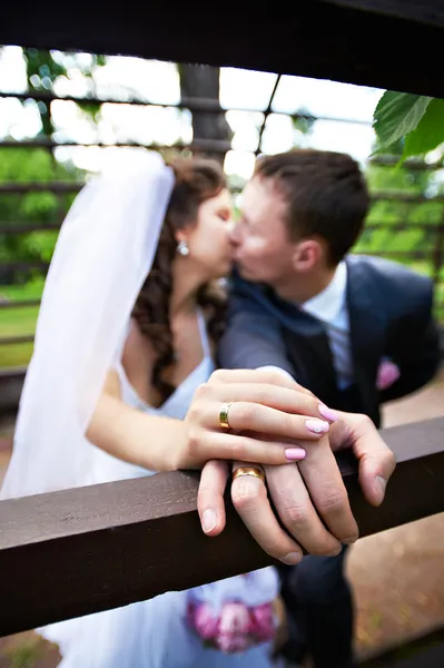 Romantic kiss bride and groom — Stock Photo, Image