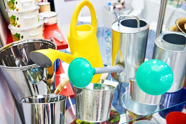 Metal Watering Cans Counter Store — стоковое фото