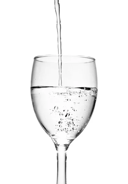 Pouring water into glass — Stock Photo, Image