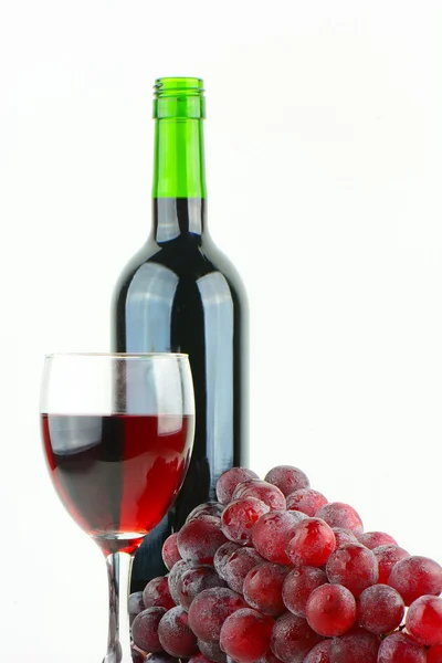 Grapes, wine glass and bottle — Stock Photo, Image