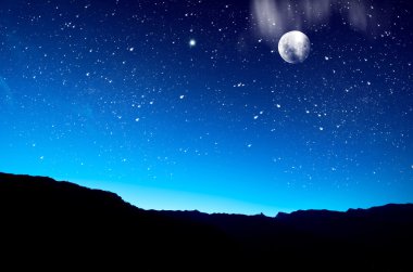 Moon over mountain