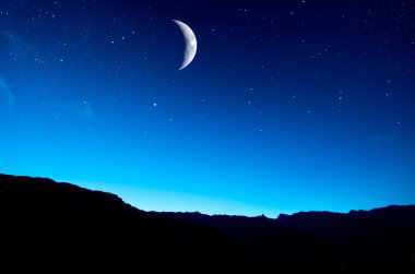 Moon over mountain