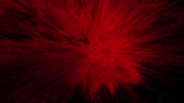 Explosion de poudre rouge sur fond noir. Mouvement au ralenti avec accélération au début. Cg animation A alpha mat — Video