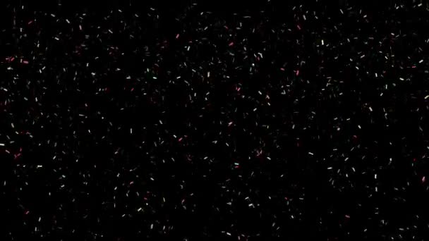 Confetti spada na czarne tło pętli animacji plus alpa. Wakacje lub imprezy. Pętla 4k — Wideo stockowe