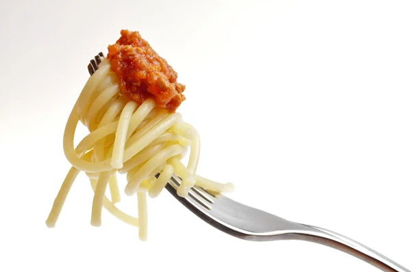 Äta spaghetti bolognese — Stockfoto