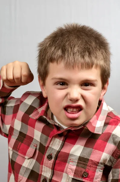 Niño haciendo caras feas 27 — Foto de Stock