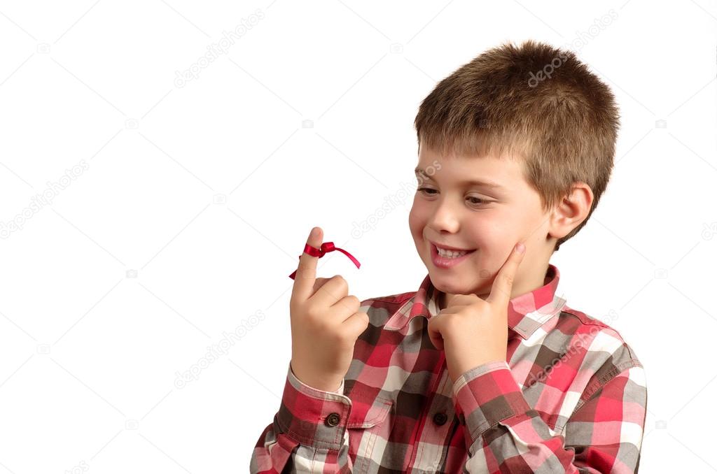 Pensive and smiling child on white background