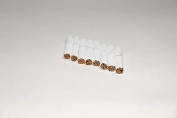 Dumansız sigara içilen sistemler için tütün çubukları. Tütün Isıtma Sistemi. Elektronik Sigara Teknolojisi, alternatif sigara. Tütün IQOS sistemi.