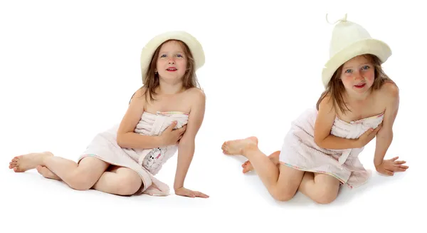 Девушка в купальном полотенце и шапке для сауны (серия ) — стоковое фото