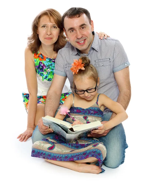 The family reads the book — Stock Photo, Image