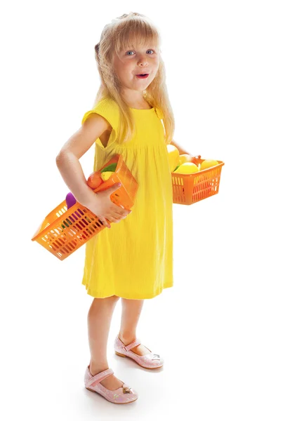 Girl in a yellow dress — Stock Photo, Image