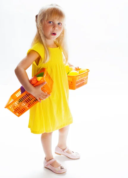 Girl in a yellow dress — Stock Photo, Image