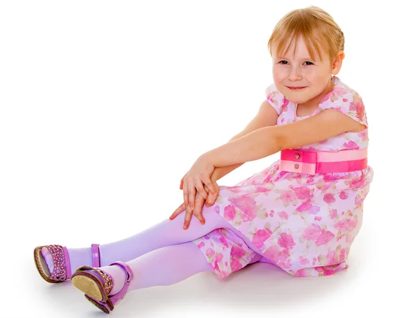 Little girl in a pink elegant dress. Stock Image