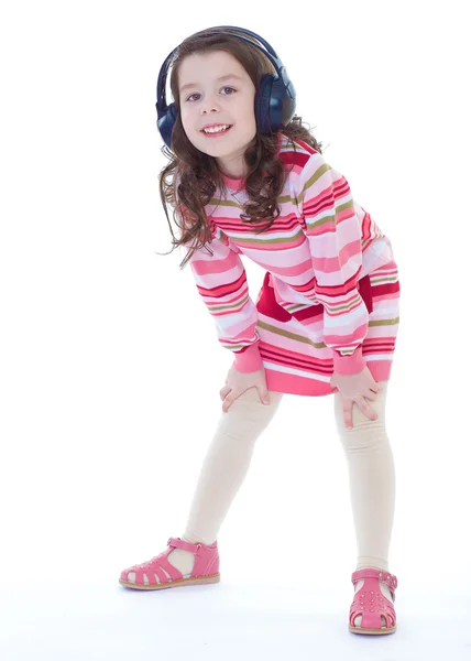 Hermosa linda niña feliz con auriculares . — Foto de Stock