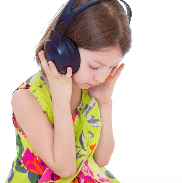 Music little girl in headphones — Stock Photo, Image