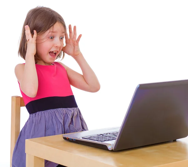 Girl at a laptop — Stock Photo, Image