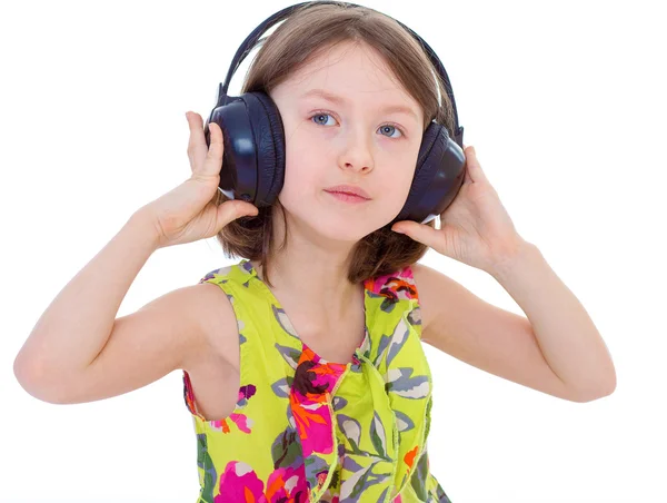 Bambina ascoltando musica . — Foto Stock