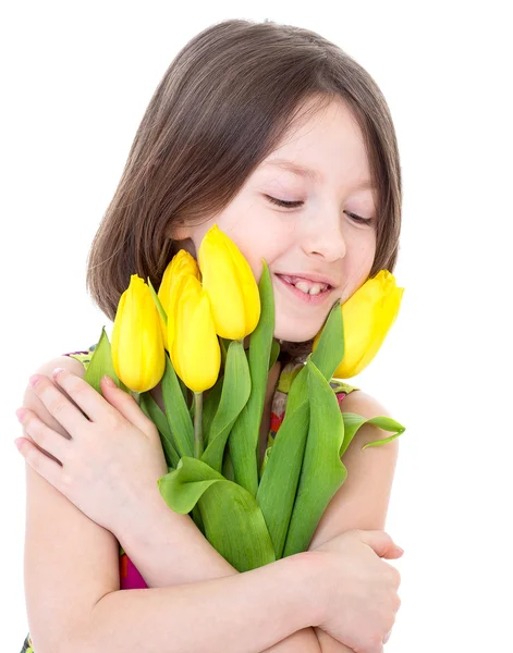 Kleines Mädchen mit schönen Blumen. — Stockfoto