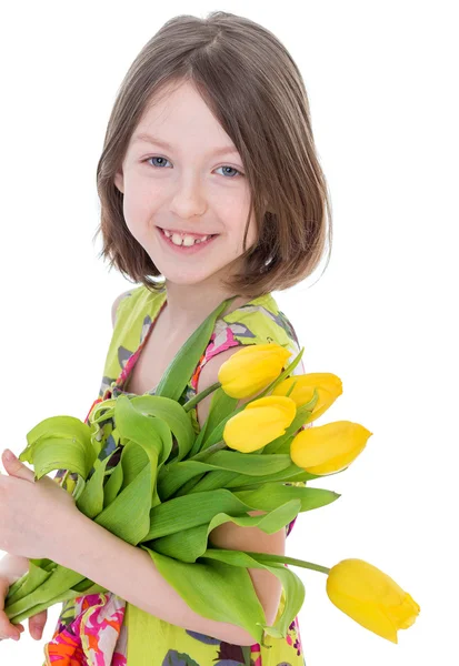 Meisje met mooie bloemen. — Stockfoto