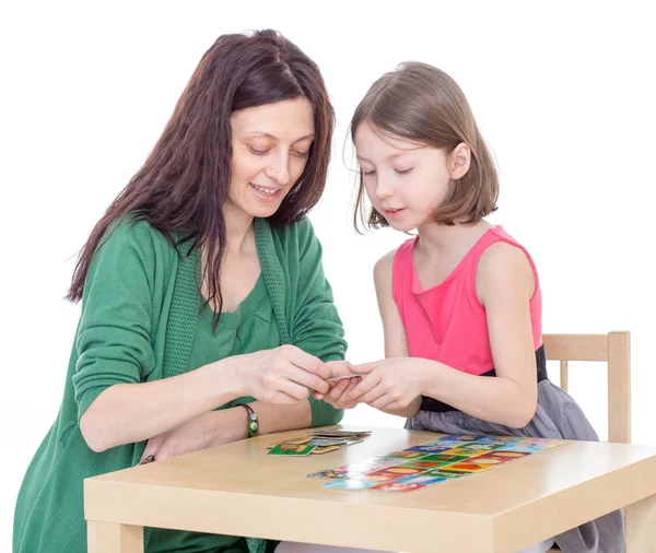 Mom and daughter at the table. — Stock Photo, Image