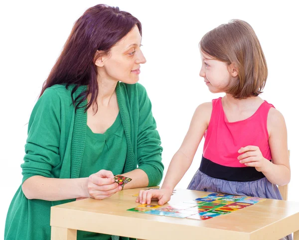 Mom and daughter at the table. — Stock Photo, Image