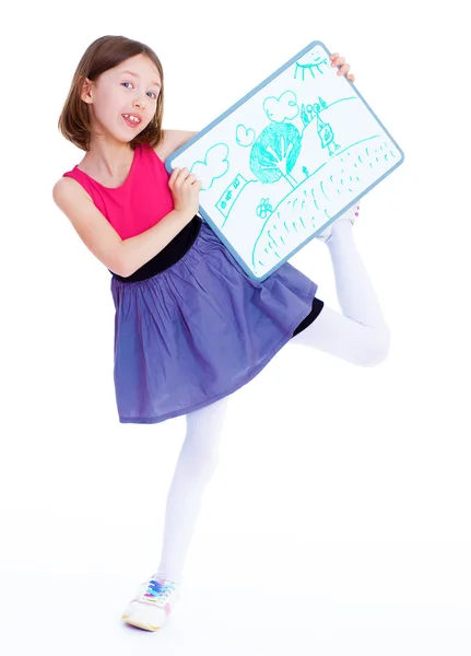 Schoolgirl girl with the tablet shows his drawing. — Stock Photo, Image