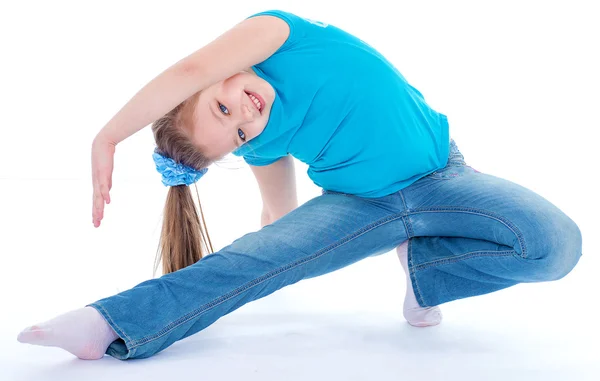 Tjej gymnast på vit bakgrund — Stockfoto