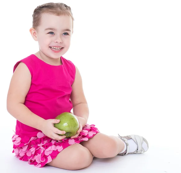 Liten flicka med äpple — Stockfoto