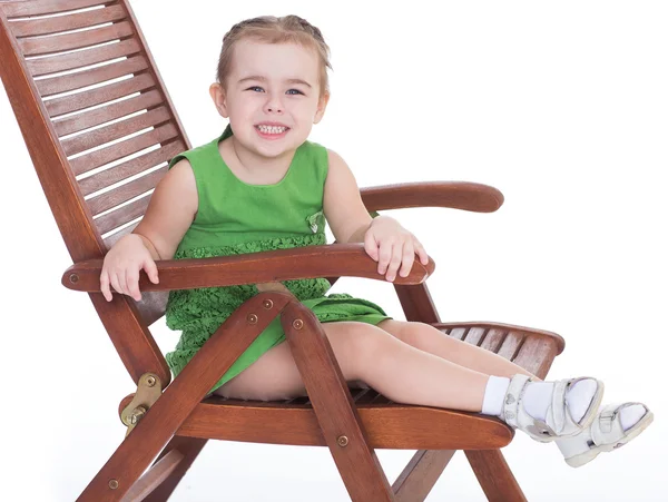 Little girl listening to seashell — Stock Photo, Image