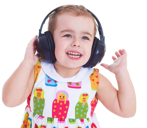 Hermosa linda niña feliz con auriculares — Foto de Stock