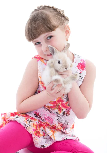 Carino bambina con il suo coniglio domestico — Foto Stock